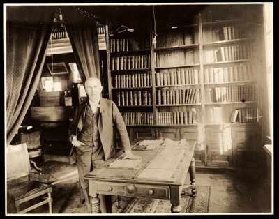 Thomas Edison in his library, 1904 by Byron Company